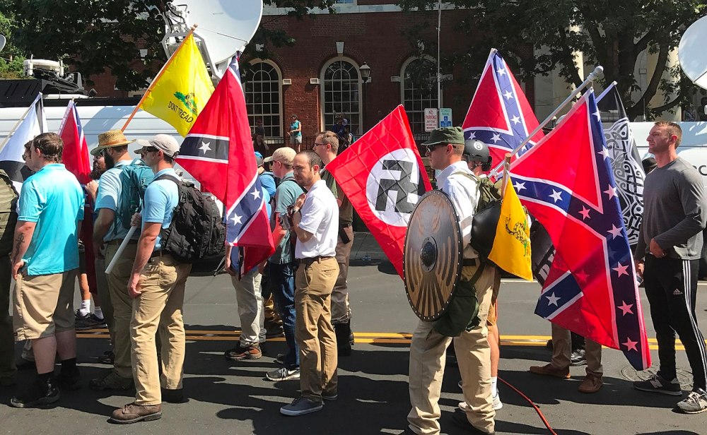 2017. Alt-right members preparing to enter Emancipation Park holding Nazi, Confederate, and Gadsden «Don't Tread on Me» flags (12 August).jpg